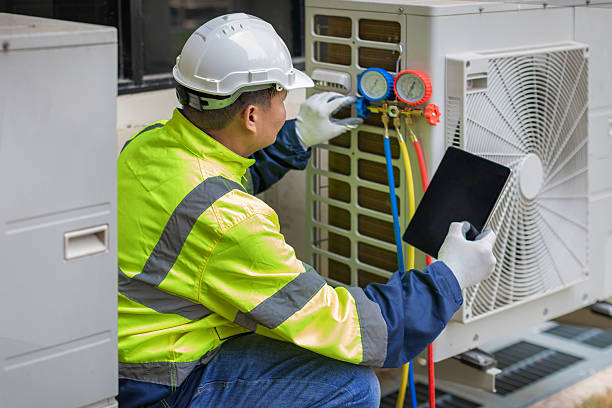 Professional Air Duct Cleaning technician working in Deweyville, UT